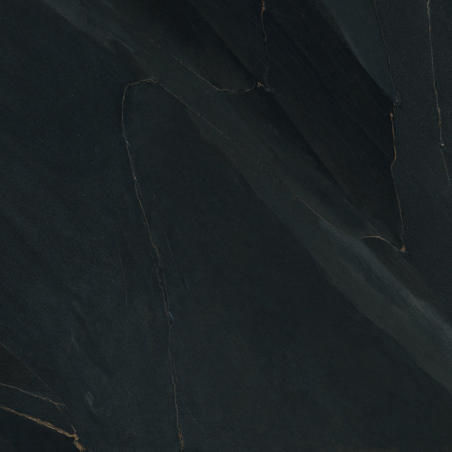 Black volcanic slate-look porcelain tile with a matte, textured surface and refined rectified edges, evoking Iceland’s rugged elegance.