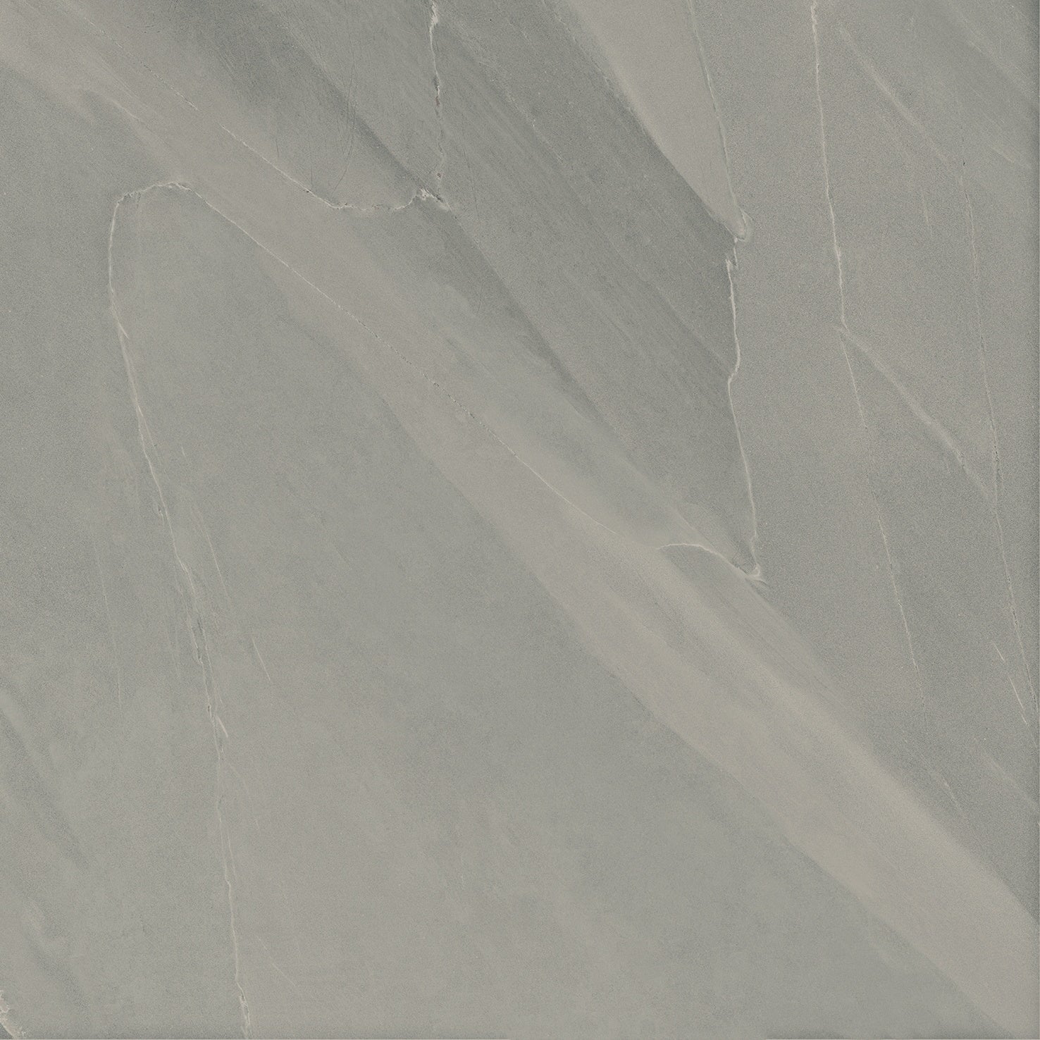Elegant matte slate-look porcelain tile with volcanic texture in soft gray, full-body depth for organic sophistication.