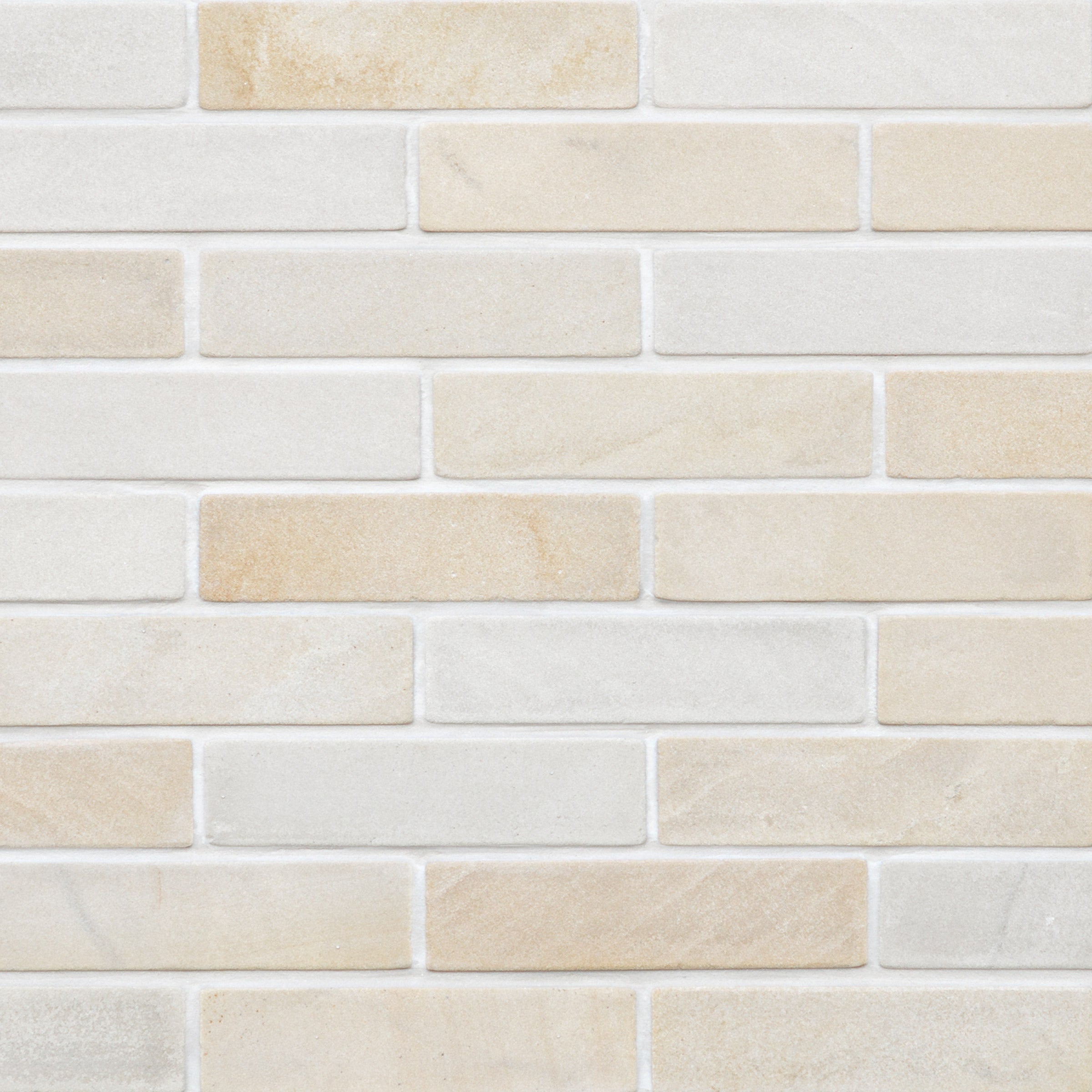 sedona sandstone brick offset tumbled beige tan linen gold 2x8x3_8 surface group natural stone resource