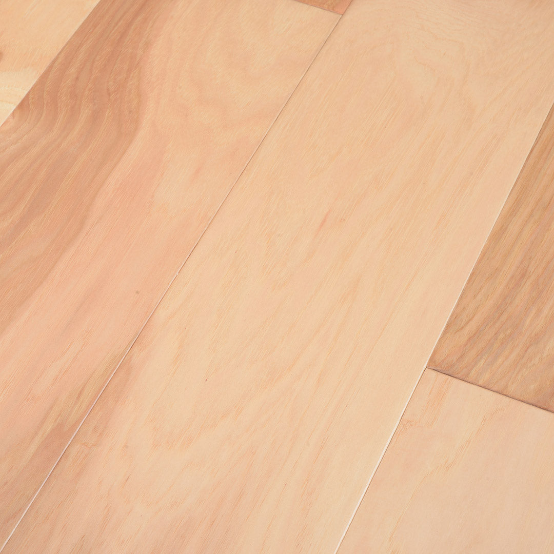 surface group artisan canyon estate natural hickory engineered hardwood flooring plank angled.jpg