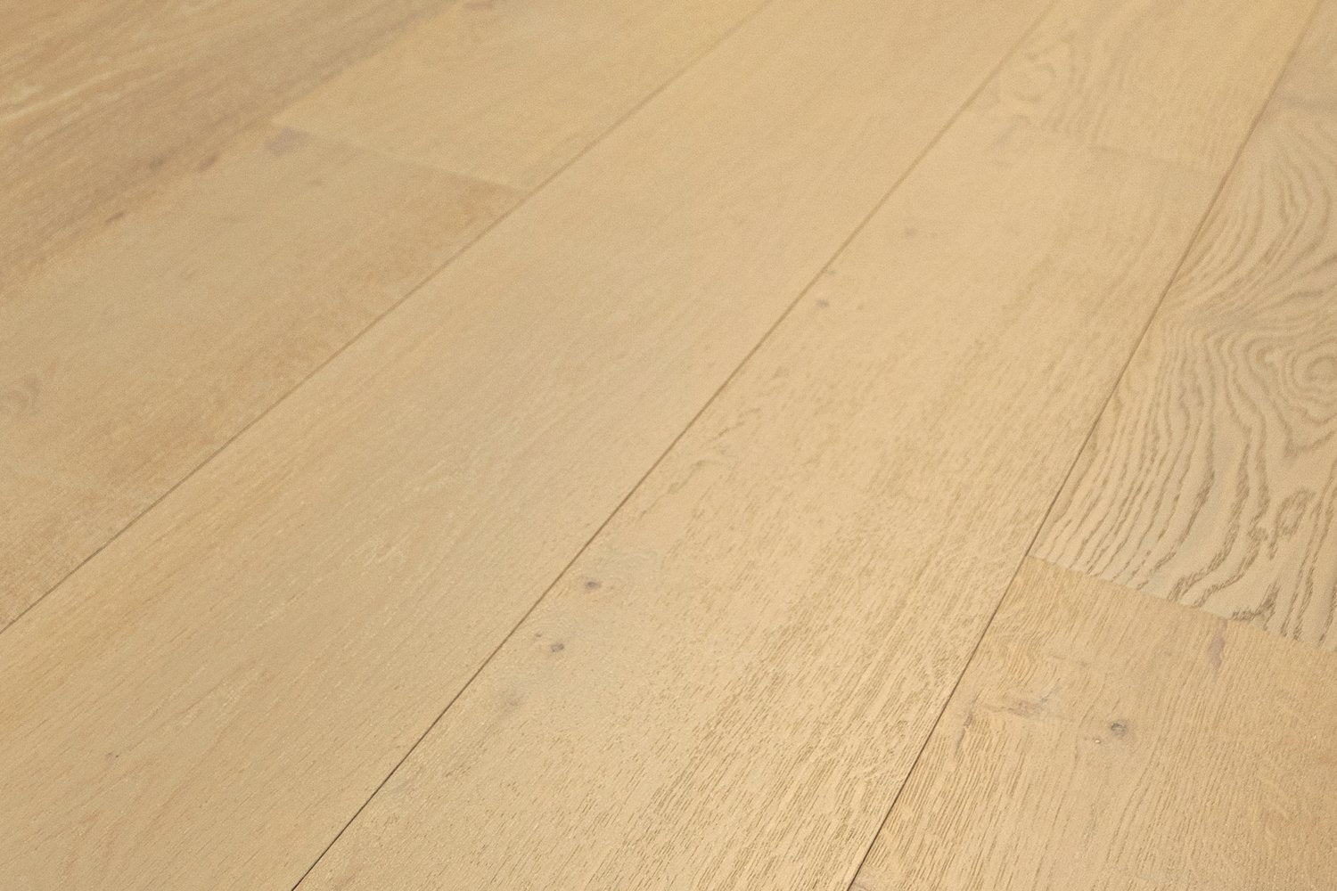 surface group artisan en bois brittany ocean vista white oak engineered hardwood flooring plank angled.jpg