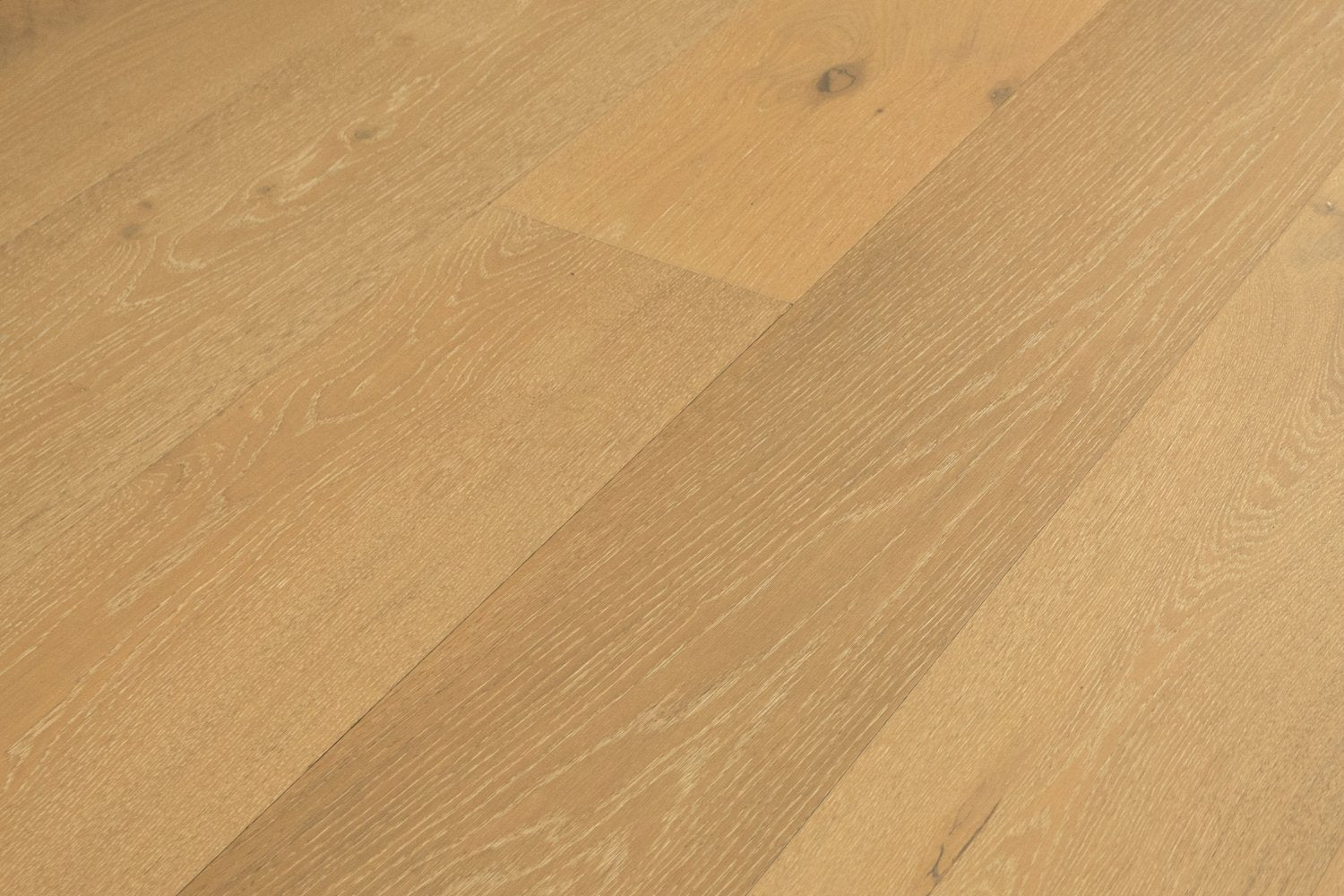 surface group artisan en bois brittany ritz cove white oak engineered hardwood flooring plank angled.jpg