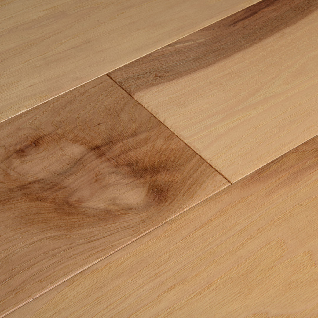 surface group artisan timberline natural hickory engineered hardwood flooring plank angled.jpg