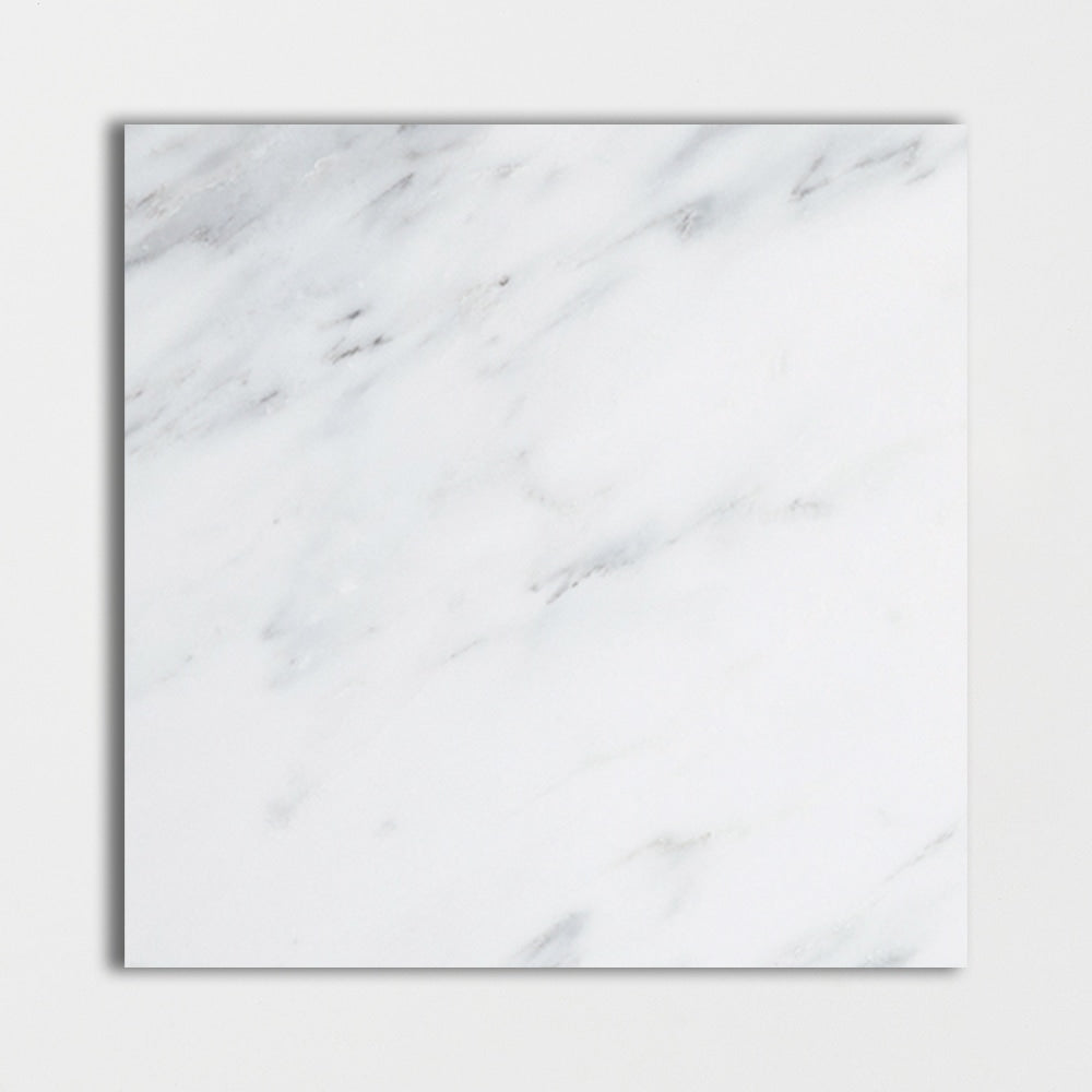 calacatta bella marble natural stone field tile square shape polished finish 12 by 12 by 3 of 8 straight edge for interior and exterior applications in shower kitchen bathroom backsplash floor and wall produced by marble systems and distributed by surface group international