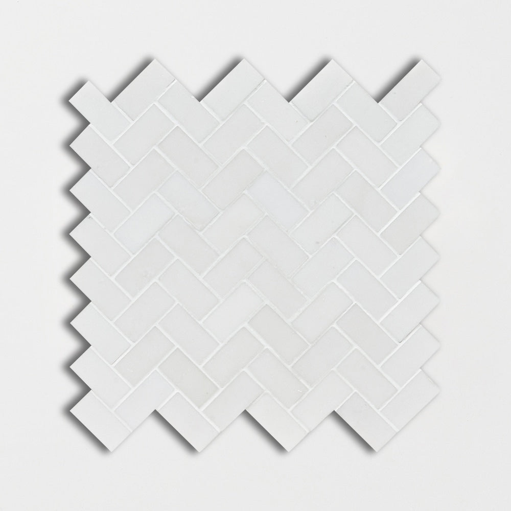 aspen white marble herringbone 1 by 2 inch rectangle shape natural stone mosaic sheet honed finish 12 and 1 of 8 by 13 and 3 of 8 by 3 of 8 straight edge for interior and exterior applications in shower kitchen bathroom backsplash floor and wall produced by marble systems and distributed by surface group international