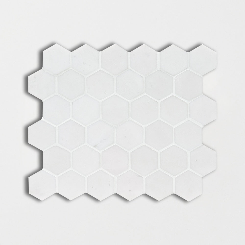 aspen white marble hexagon shape shape natural stone mosaic sheet honed finish 10 and 3 of 8 by 12 by 3 of 8 straight edge for interior and exterior applications in shower kitchen bathroom backsplash floor and wall produced by marble systems and distributed by surface group international