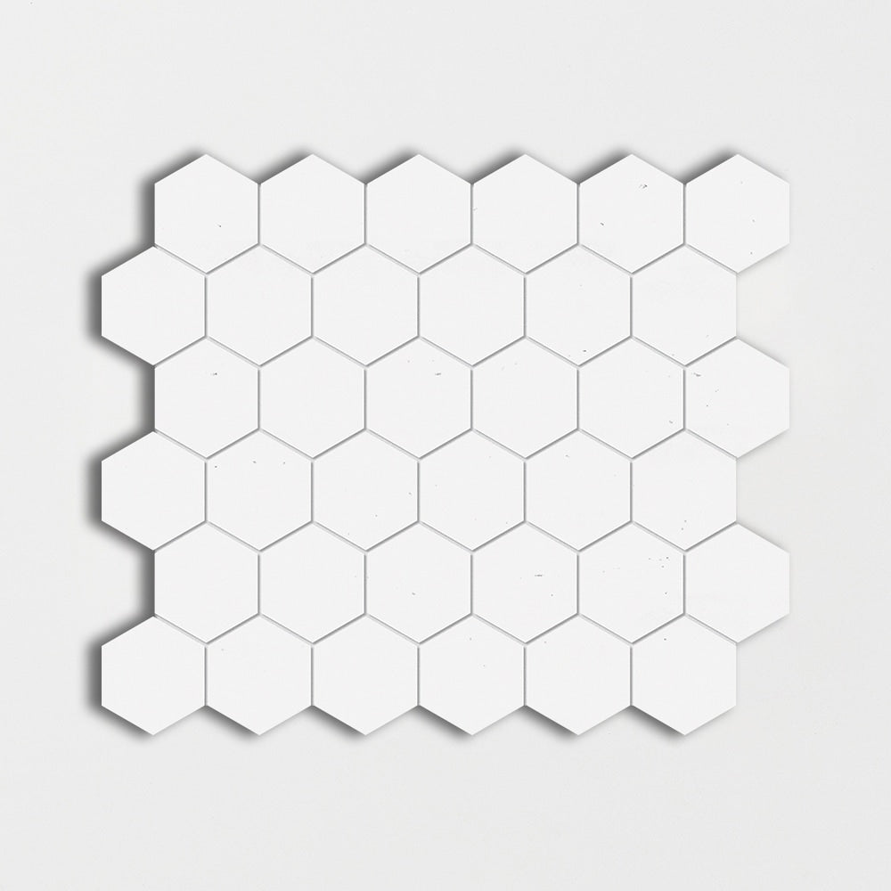 thassos white marble hexagon shape shape natural stone mosaic sheet honed finish 10 and 3 of 8 by 12 by 3 of 8 straight edge for interior and exterior applications in shower kitchen bathroom backsplash floor and wall produced by marble systems and distributed by surface group international