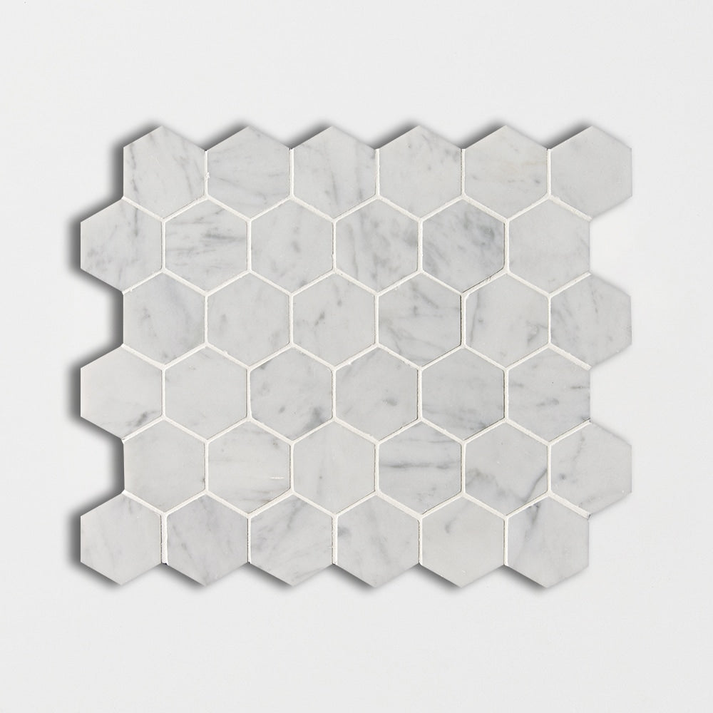 white carrara marble hexagon shape shape natural stone mosaic sheet honed finish 10 and 3 of 8 by 12 by 3 of 8 straight edge for interior and exterior applications in shower kitchen bathroom backsplash floor and wall produced by marble systems and distributed by surface group international