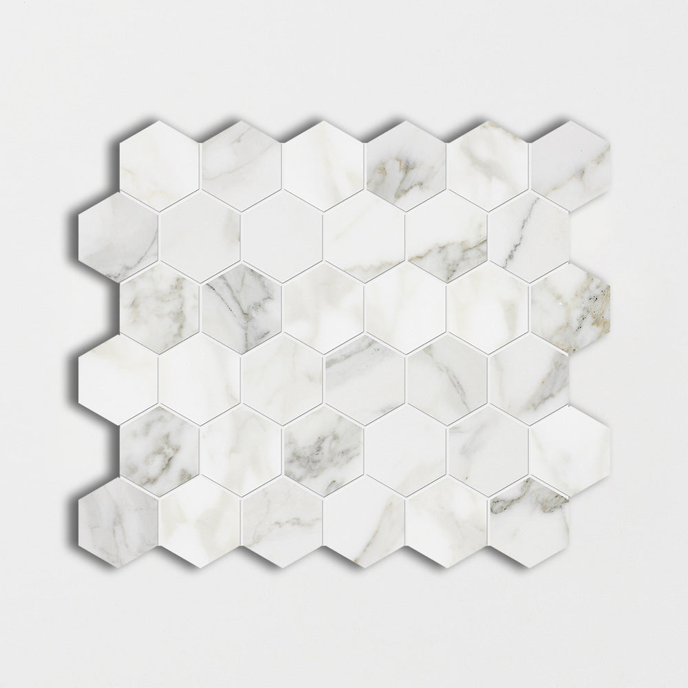 calacatta gold marble hexagon shape shape natural stone mosaic sheet polished finish 12 by 12 by 3 of 8 straight edge for interior and exterior applications in shower kitchen bathroom backsplash floor and wall produced by marble systems and distributed by surface group international