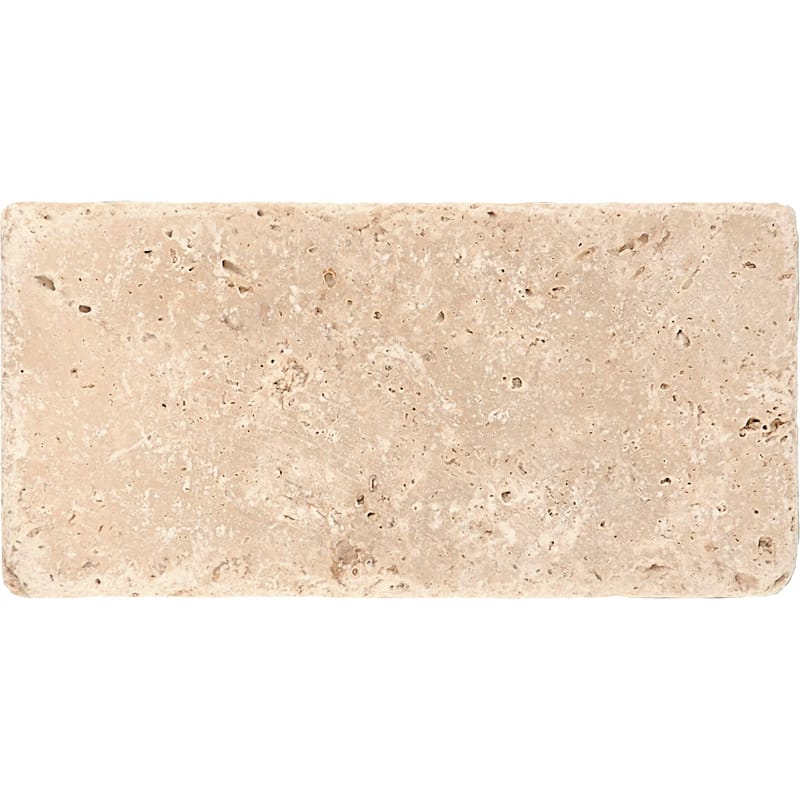 ivory travertine natural stone field tile rectangle shape tumbled finish 3 by 6 by 3 of 8 tumbled finish for interior and exterior applications in shower kitchen bathroom backsplash floor and wall produced by marble systems and distributed by surface group international