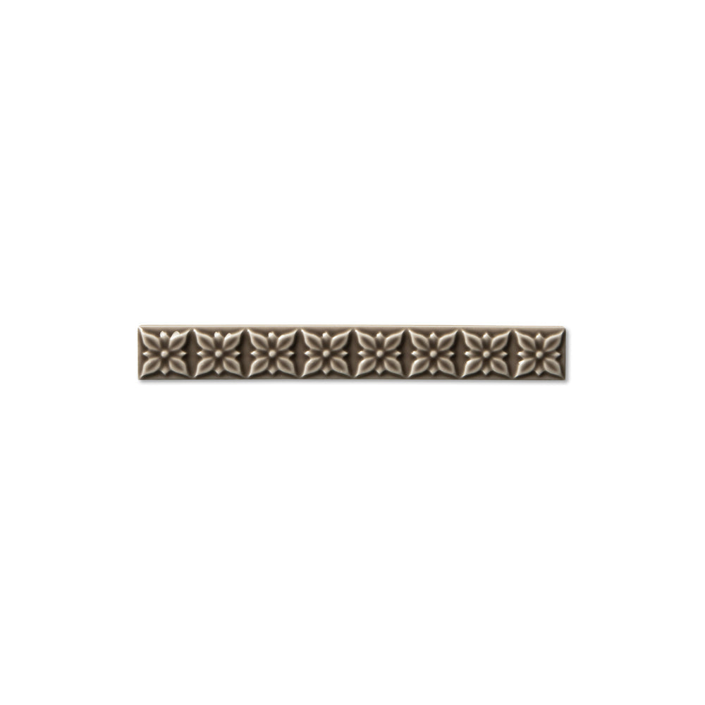 adex ceramic tile for indoor wall and or floor studio timberline molding deco liner deco glossy translucent mono embossed deco 1x7_8 embossed ponciana distributed by surface group international