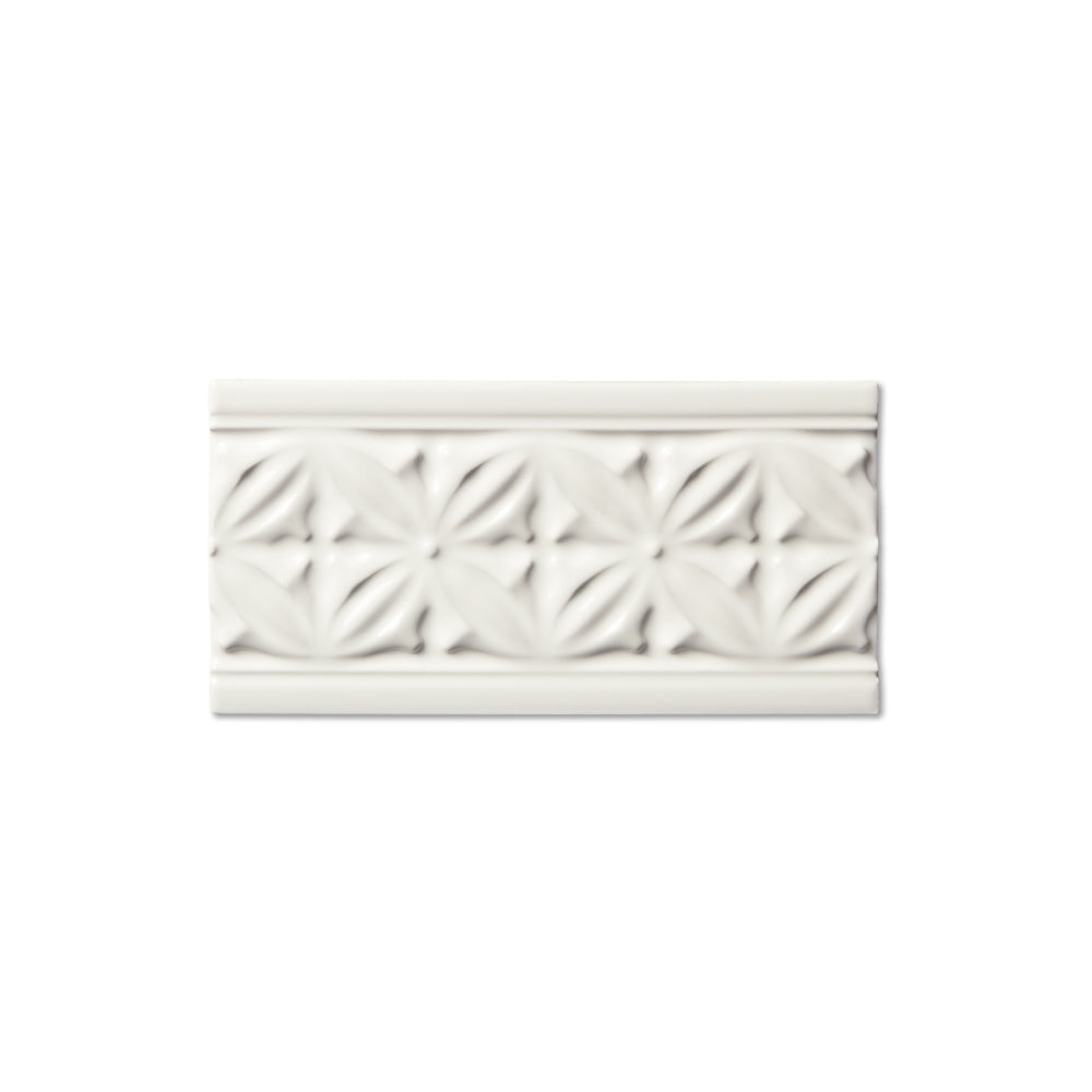 adex ceramic tile for indoor wall and or floor studio snow cap molding deco border glossy translucent mono embossed deco 3_8x7_8 embossed gables distributed by surface group international