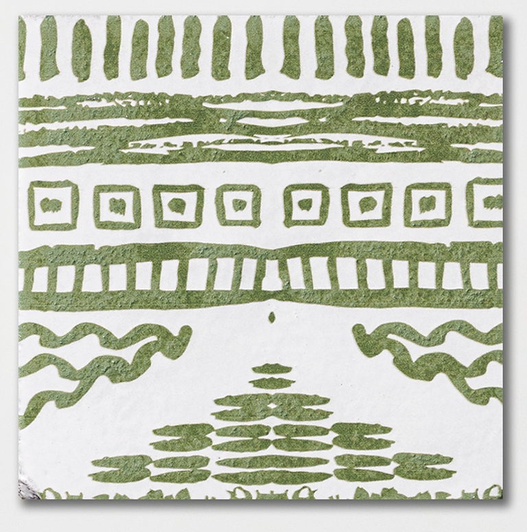 batik 1 antique glazed terracotta deco tile size six by six sold by surface group manufactured by marble systems used for kitchen backsplashes living room accent walls and bathroom walls