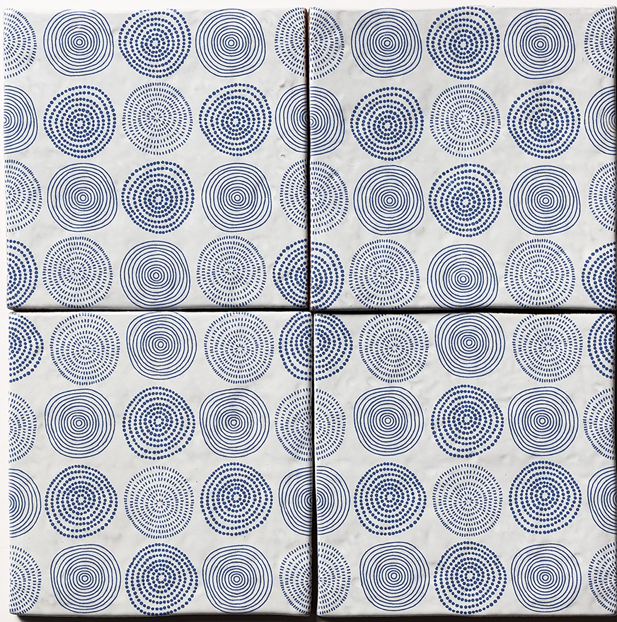 batik 4 antique glazed terracotta deco tile size six by six sold by surface group manufactured by marble systems used for kitchen backsplashes living room accent walls and bathroom walls
