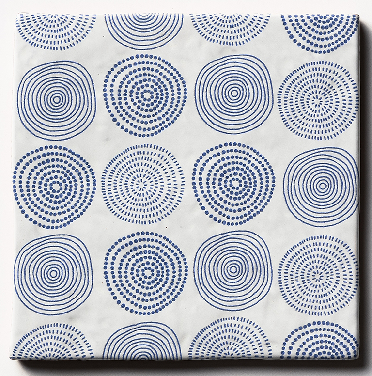 batik 4 antique glazed terracotta deco tile size six by six sold by surface group manufactured by marble systems used for kitchen backsplashes living room accent walls and bathroom walls