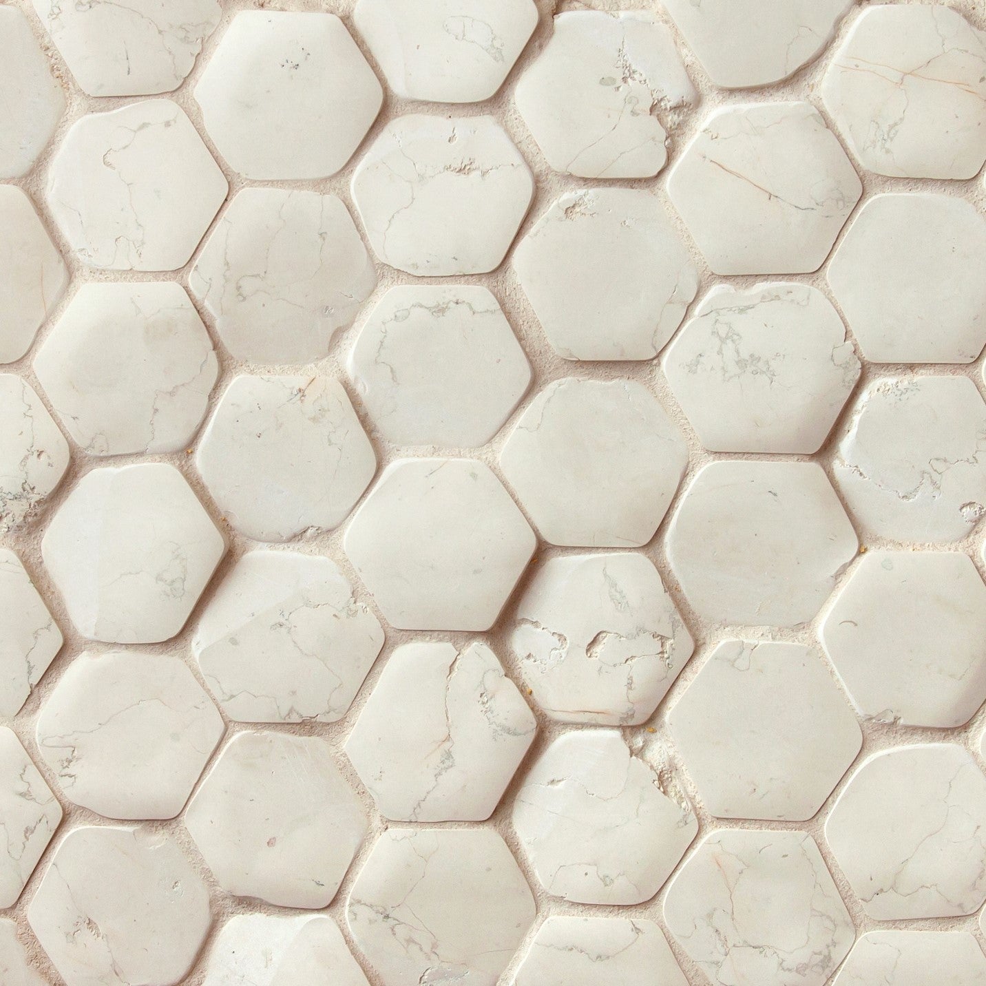 giovanni barbieri timeworn bianco antico natural white marble hexagon pattern mosaic distributed by surface group international