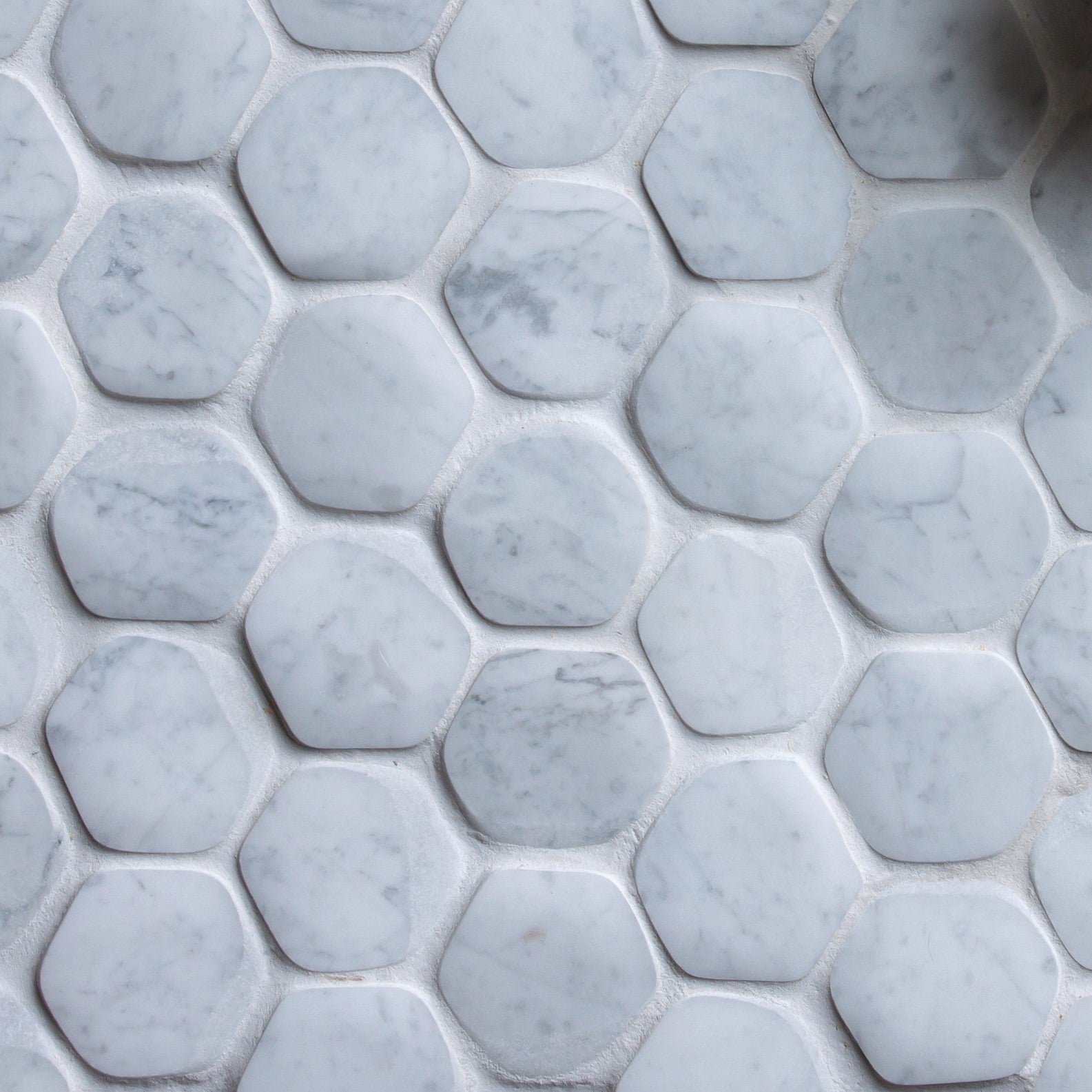 giovanni barbieri timeworn carrara natural white marble hexagon pattern mosaic distributed by surface group international