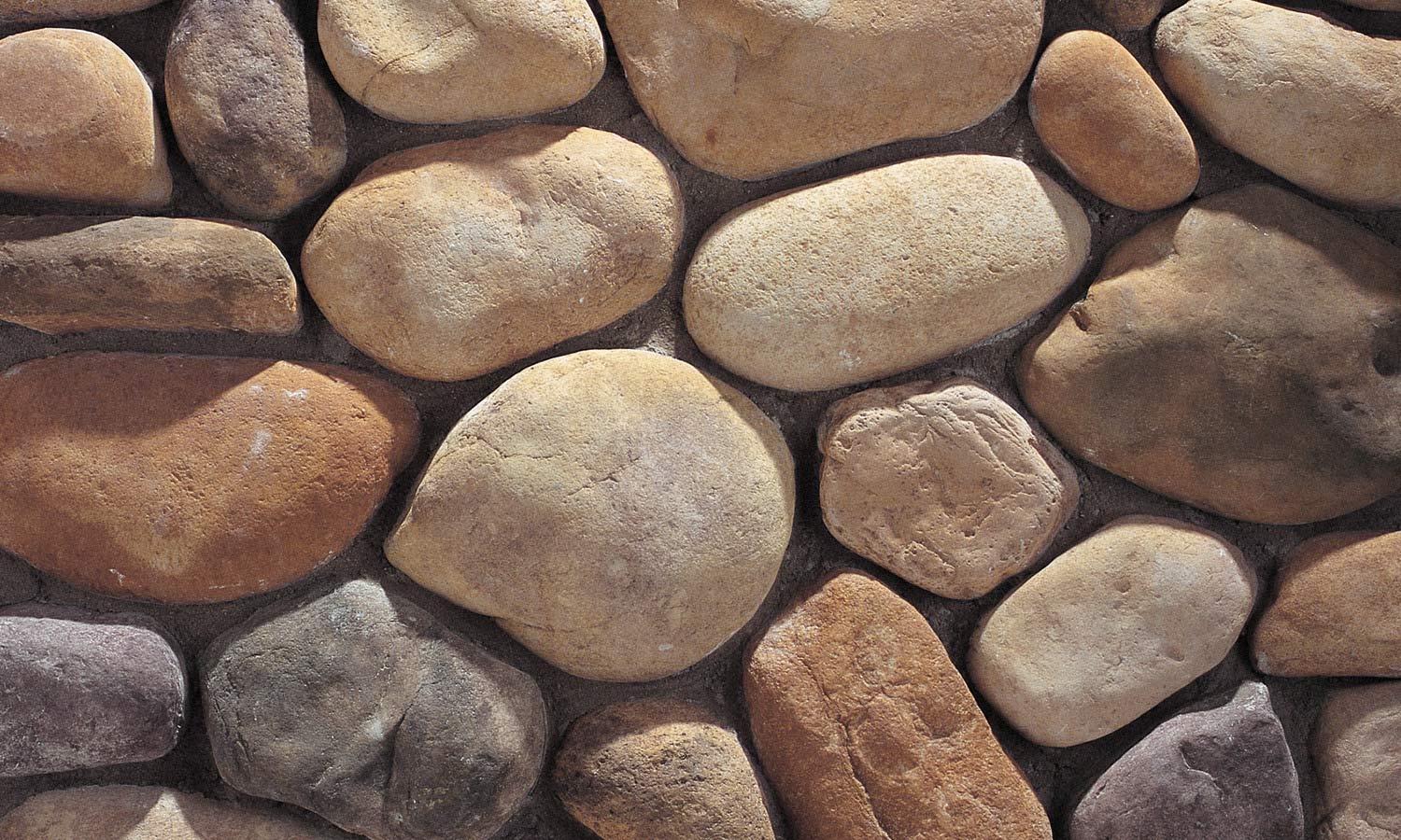 faux stone wall veneer flat colorado river rock for outdoor and indoor wall by surface group eldorado stone