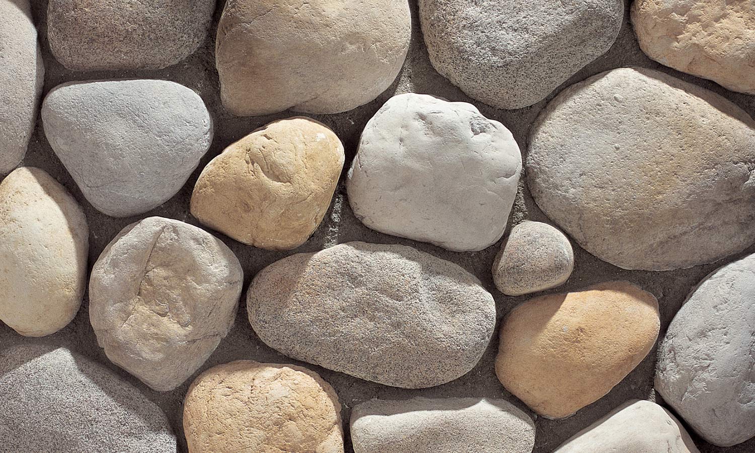 faux stone wall veneer flat rio grande river rock for outdoor and indoor wall by surface group eldorado stone