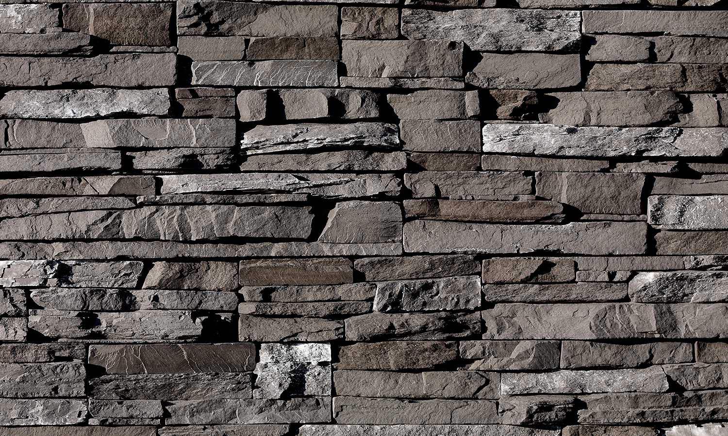 faux stone wall veneer flat dark rundle stacked stone for outdoor and indoor wall by surface group eldorado stone